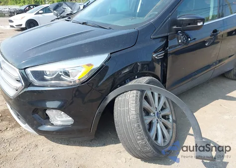2017 Ford Escape Titanium z USA, uszkodzony, nr VIN 1FMCU0JD6HUE23085